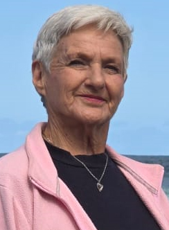 Debbie, who provides the house and pet sitting, smiling